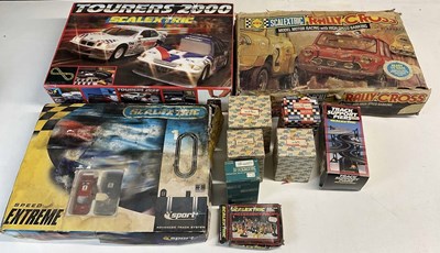 Lot 122 - SCALEXTRIC; a quantity of boxed items, to...