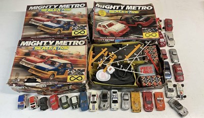 Lot 125 - SCALEXTRIC; three incomplete Mighty Metro sets,...