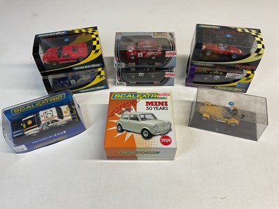 Lot 141 - SCALEXTRIC; nine boxed cars to include Mini...