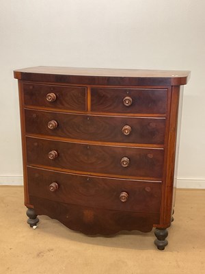 Lot 821 - A 19th century mahogany bowfront chest of two...