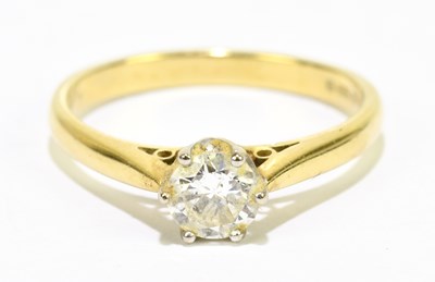 Lot 1051 - An 18ct yellow gold diamond solitaire ring,...