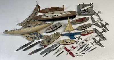 Lot 244 - A quantity of toy boats and planes, to include...