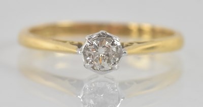 Lot 1236 - An 18ct yellow gold diamond solitaire ring,...