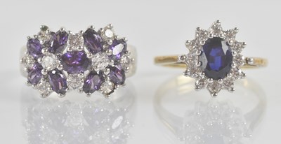 Lot 1218 - A 9ct yellow gold sapphire and white stone set...