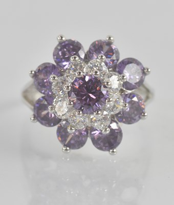 Lot 1240 - A 9ct white gold tourmaline and white stone...