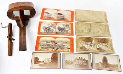 Lot 322 - A wooden framed sterescopic viewer together...