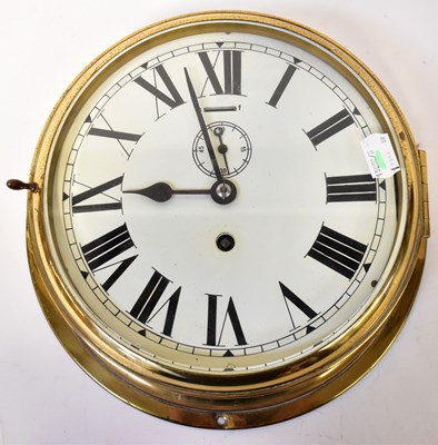 Lot 514 - HARRISON LINE; a ship's brass bulkhead clock,...