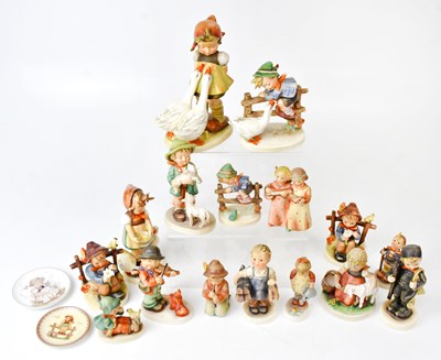 Lot 131 - GOEBEL HUMMEL; a collection of figures of...
