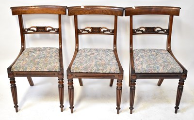 Lot 54 - Six matched Regency mahogany bar-back dining...