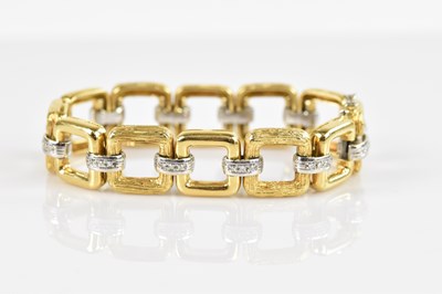 Lot 1104 - A good yellow and white metal textured and...