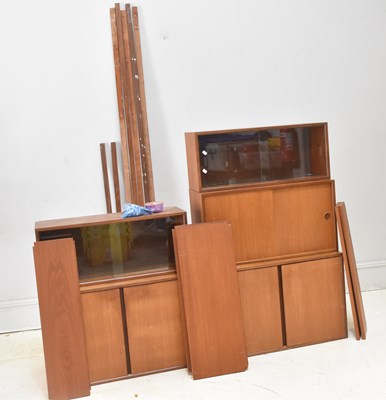 Lot 20 - A mid century teak wall system with two...