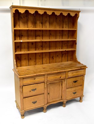 Lot 7 - An early 20th century pine dresser, the...