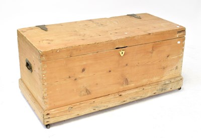 Lot 65 - A rustic pine blanket box with campaign-style...