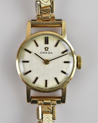 Lot 506 - OMEGA; a lady's 9ct gold cased wristwatch, the...