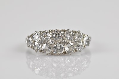 Lot 2252 - A white metal diamond set twelve stone double...