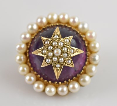 Lot 2067 - A 9ct yellow gold seed pearl set amethyst...