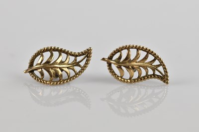 Lot 1435 - A pair of 9ct yellow gold leaf effect earrings,...