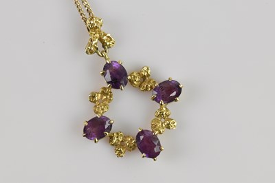 Lot 2204 - A yellow metal amethyst set and gold nugget...