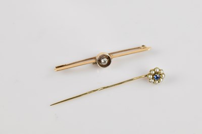 Lot 1318 - A Victorian yellow metal bar brooch, stamped...