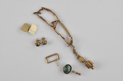 Lot 1463 - A 9ct gold cufflink, with engine turned...