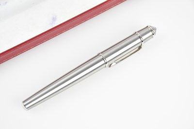 Lot 35 - CARTIER; a Diabolo brushed steel and chrome...