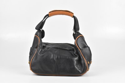 Lot 377 - TOD'S; a black leather shoulder bag, trimmed...