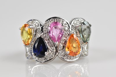 Lot 2421 - An 18ct white gold multigem dress ring, set...