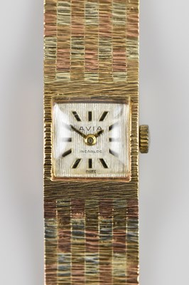 Lot 492 - AVIA; a lady's 9ct yellow and rose textured...