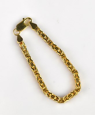 Lot 1146 - A yellow metal box link bracelet, stamped '9kt'...