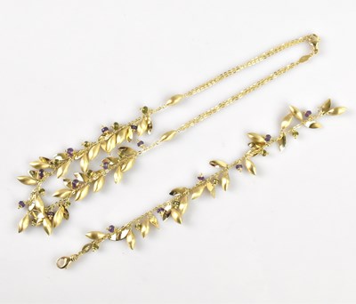 Lot 2037 - A 9ct yellow gold multigem set drop necklace,...