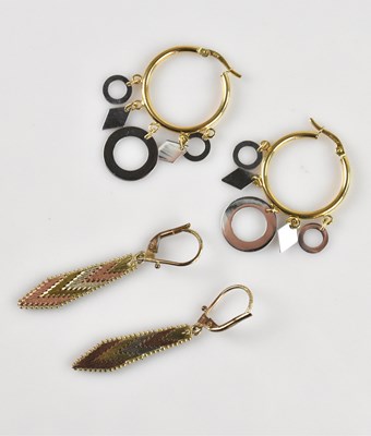 Lot 1385 - A pair of 9ct yellow and white gold hoop...