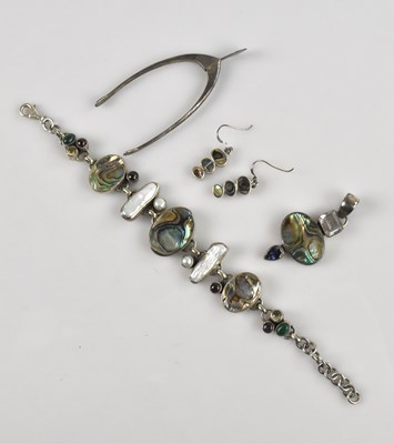 Lot 1034 - A sterling silver and abalone shell bracelet,...