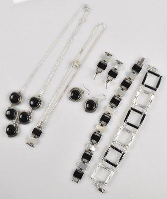 Lot 1042 - A collection of contemporary sterling silver...