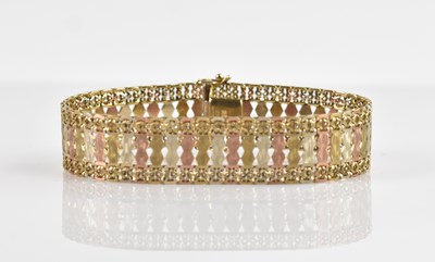 Lot 1148 - A 9ct tri-colour gold openwork filigree type...