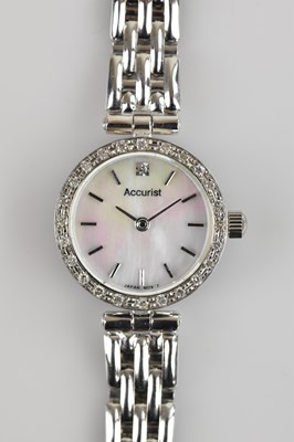 Lot 508 - ACCURIST; a lady's 9ct gold cased wristwatch,...