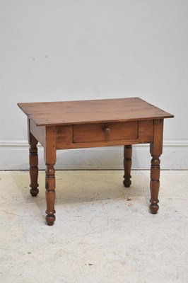 Lot 93 - A small old pine single drawer side table, on...