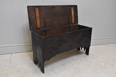 Lot 68 - A late 17th century carved oak six plank...