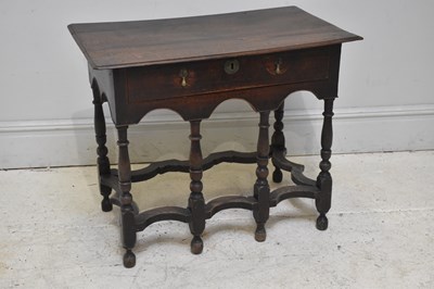 Lot 69 - A late 17th century and later oak side table...