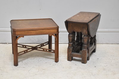 Lot 300 - A reproduction oak drop-leaf coffee table on...