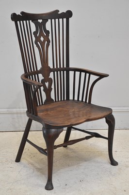 Lot 199 - An early 19th century ash and elm elbow chair,...