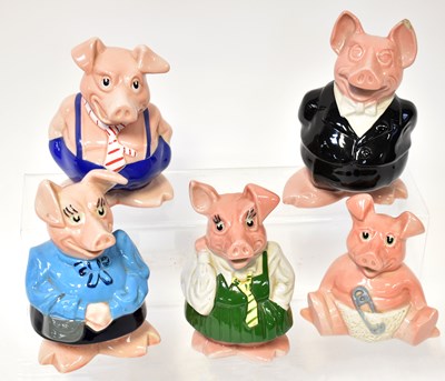 Lot 134 - WADE; a set of five Nat West piggy banks,...