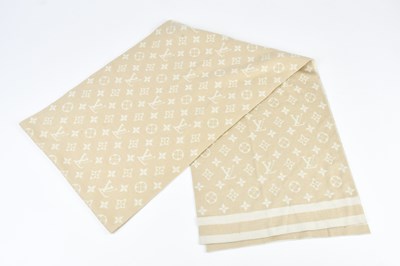 Lot 9 - LOUIS VUITTON; a cream and tan 100% wool...
