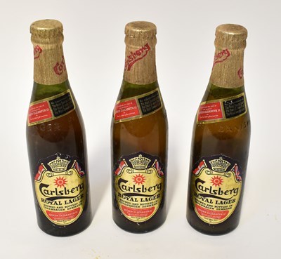 Lot 336 - A Carlsberg Royal Lager pack containing three...