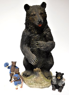 Lot 788 - A resin model of a bear in a standing position,...