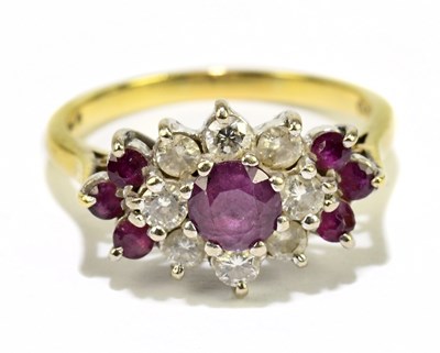 Lot 1047 - An 18ct yellow gold ruby and diamond stepped...