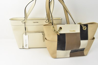 Lot 340 - CALVIN KLEIN; two ladies' handbags, one still...