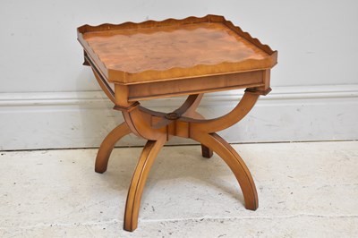Lot 157 - A reproduction walnut coffee table, height...