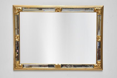 Lot 38 - A modern gilt framed rectangular wall mirror,...