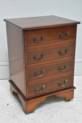 Lot 160 - A reproduction three drawer media cabinet,...