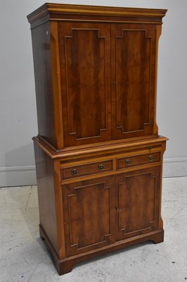Lot 129 - A reproduction mahogany drinks cabinet,height...